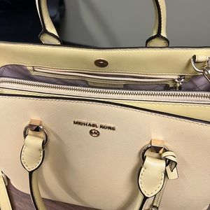 Michael Kors butter cup in color used 3 months in great condition!